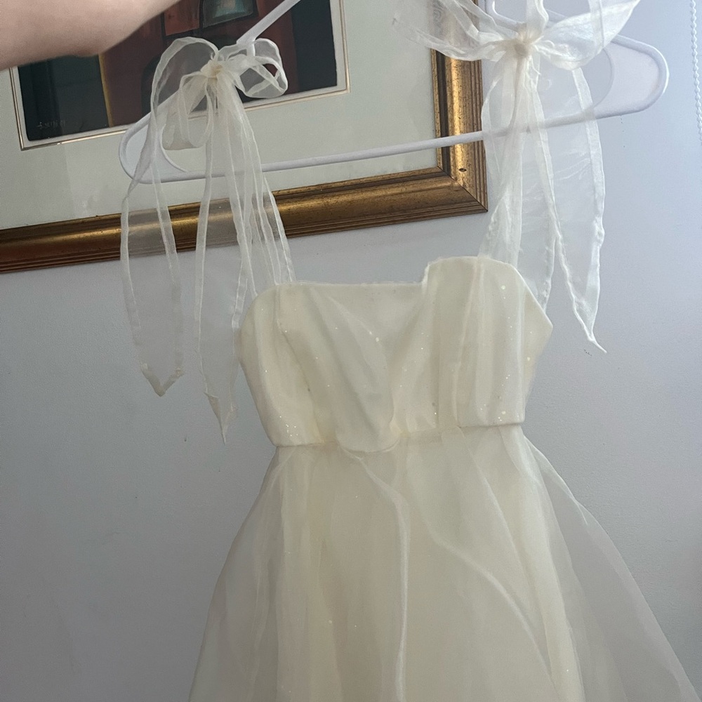 Lucy in the Sky Cream bow on shoulders mini dress